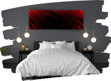 Tableau noir et rouge dans une chambre à coucher